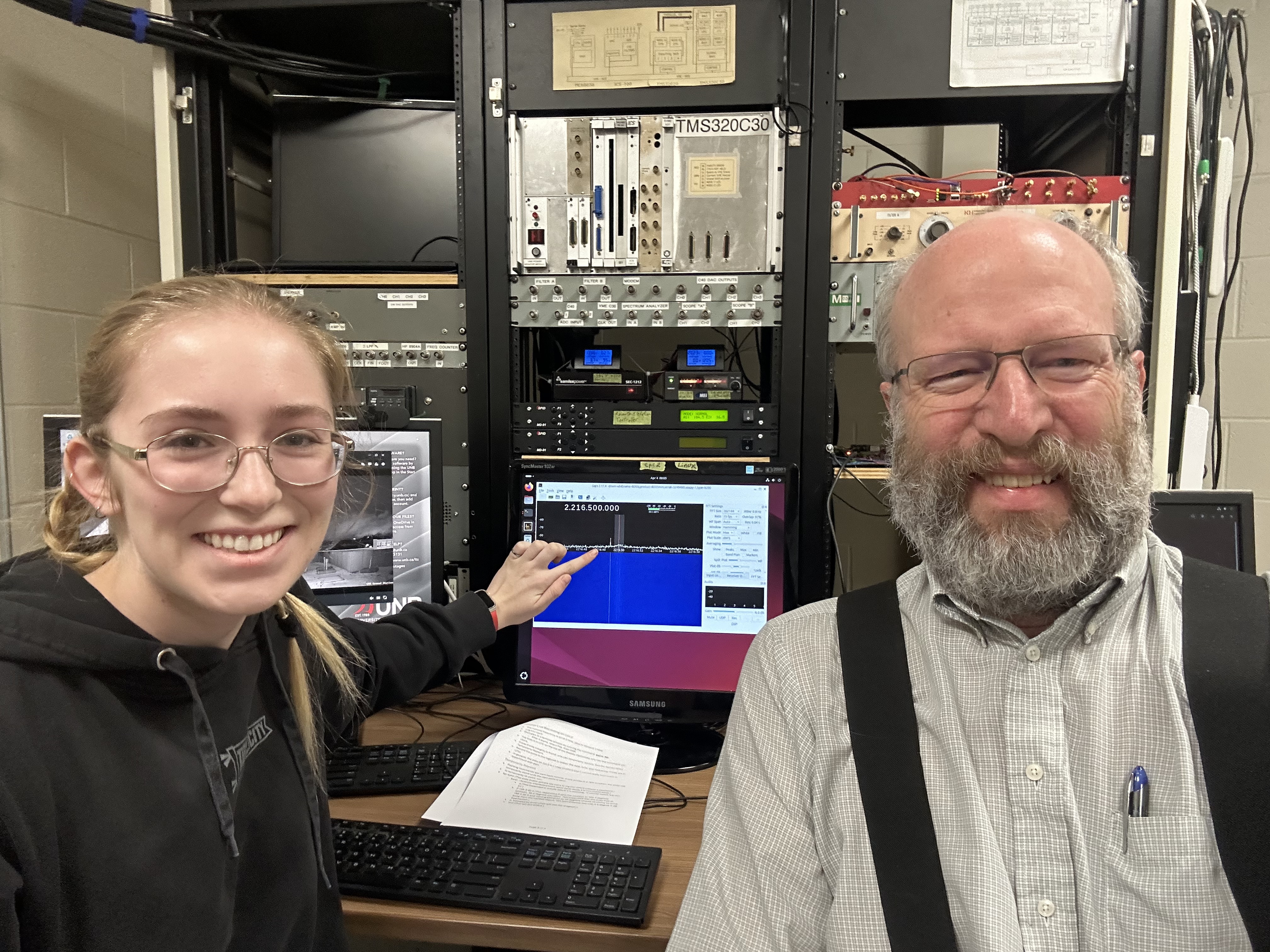 Megan MacDonald and Brent Petersen spot the Artemis II signal in the live display on April 4, 2026.